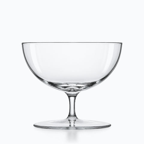 Coupe champagne large en verre cristallin transparent, demi-sphère à jambe courte, fond clair