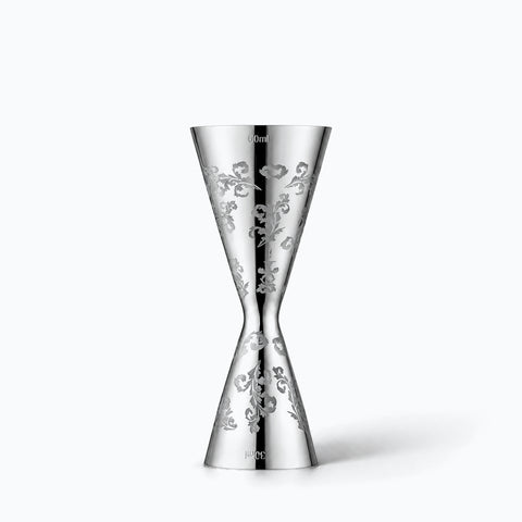 Doseur Fougère double cône en inox gravé, seul sur fond blanc avec ombre portée