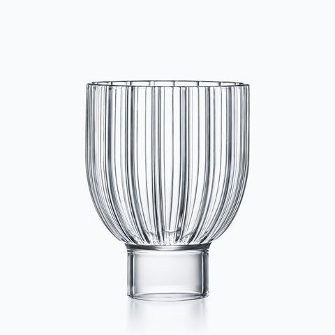 Verre à pied bas transparent à corps côtelé sur socle cylindrique lisse